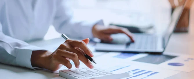 Bookkeeper organizing financial records and tracking expenses to maintain a healthy and well-managed business