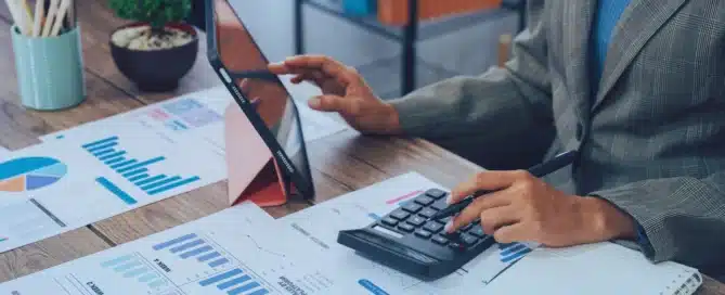 Business owner using cloud accounting software to manage financial records, invoices, and business expenses